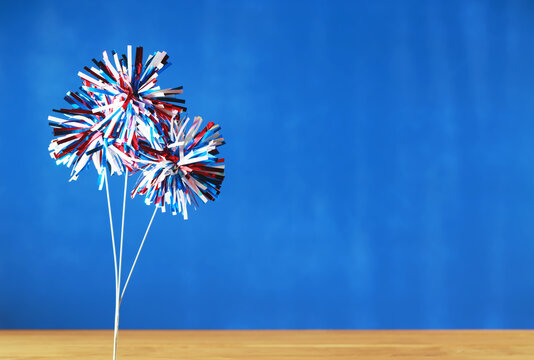 4th of July decorations on blue background