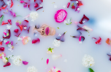 Closeup view of Woman in bath. Her face is drowning in a gentle bath.