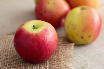 apple on wood floor.