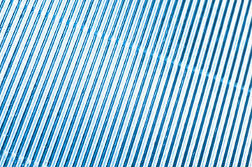 Fototapeta premium Abstract metallic blue background with stripes
