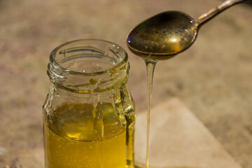 Organic pure honey in jar. Close up