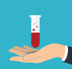 hand holding laboratory filled with a clear liquid and blue background