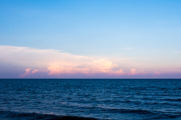 Clouds in sunset sky over sea