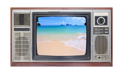 Retro television on white background with image of sand on the beach on screen.