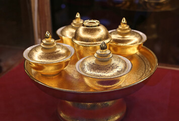 Fototapeta na wymiar Golden thai ceramic handmade bowl.