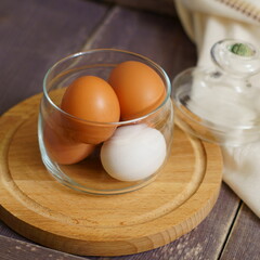 Chicken eggs in a glass jar