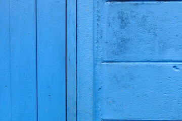 Close up Wood Blue door with Concrete Wall.