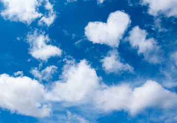 heart white cloud on blue sky background. weather or love abstract symbol - Powered by Adobe