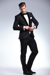 business man buttoning up
