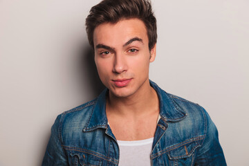 Fototapeta premium face of a young man in jeans jacket