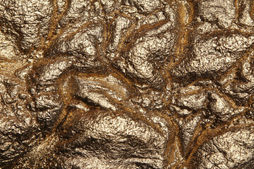 Dark gold painted polyethylene background