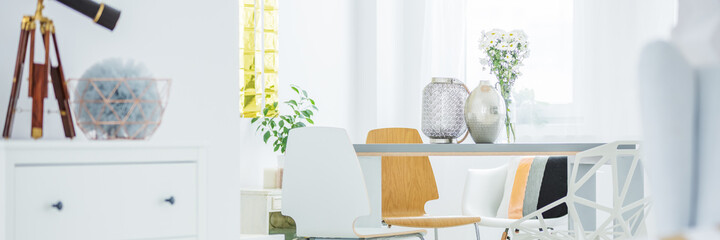 Communal table in bright room