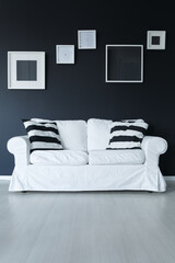 Sofa with cushions and frames