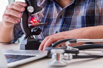 High precision engineering with man working with microscope