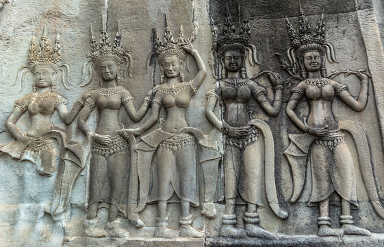 Detail of a Stone Carved Relief in the famous Angkor Wat in Cambodia and the largest religious monument in the world. Location: Siem Reap, Cambodia. Artistic picture. Beauty world.