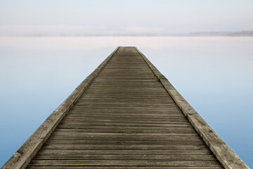 Obraz na płótnie Canvas Zen jetty on foggy lake