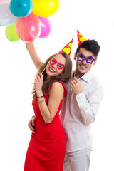 Young couple with balloons