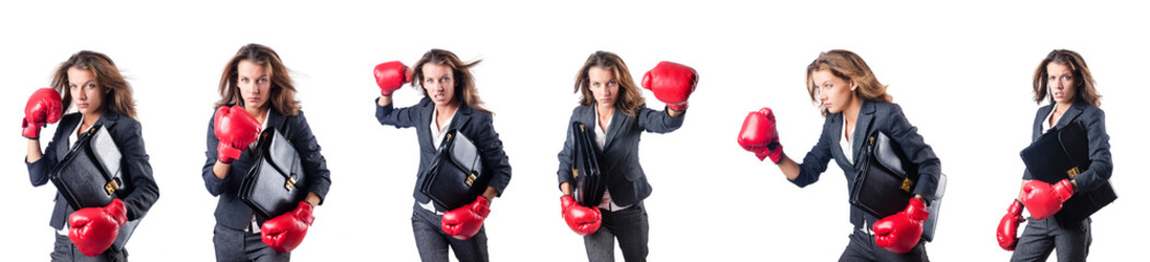 Young woman with boxing gloves isolated on white