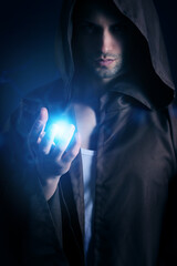 handsome wizard showing an energy blast