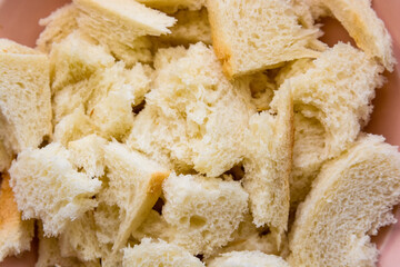 Close up pieces of bread in bowl