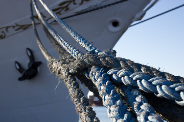 The ropes in the background the bow of the ship