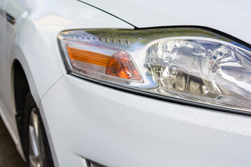 Close-up headlights of car