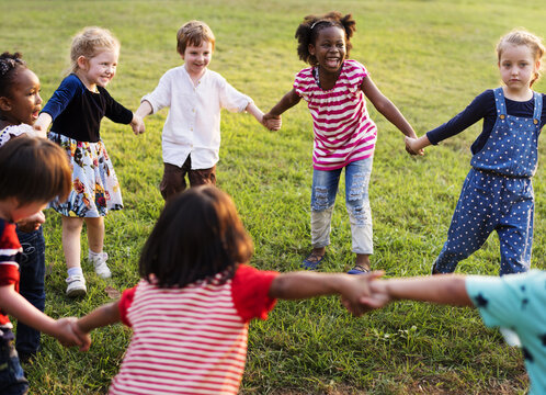 Diversity Group Of Kids Holding Hands In Circle