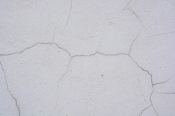 Close up cracked cement plaster texture background