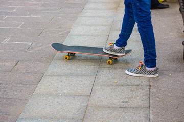 Fototapeta na wymiar Close up skater rides skateboard