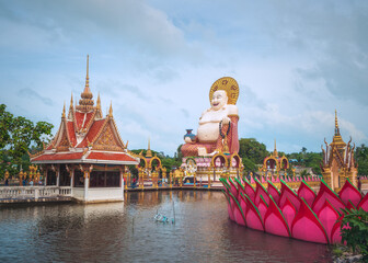 Naklejka premium Budai, the Chinesse Style Laughing Buddha, in Wat Plai Leam Temple on Koh Samui Island, Thailand