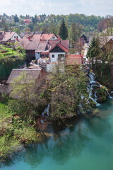 Fototapeta na wymiar Small village on a river