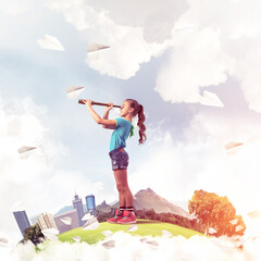 Concept of careless happy childhood with girl looking in future
