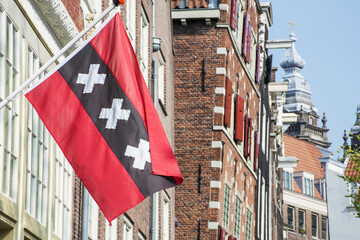 Flag of Amsterdam in the center of the city in the day