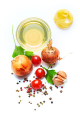 Italian food & drink healthy lifestyle concept: Aromatic spicy Italian herbs vegetables and spices. Tomatoes, onion, pepper, garlic, parsley, pasta & olive oil. Top view. Isolated on white.