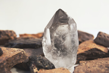 Large quartz crystal on white background close-up