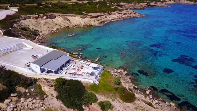 Aerial drone video of seascape in Hamolia with turquoise waters, Porto Rafti, Mesogeia, Attica, Greece