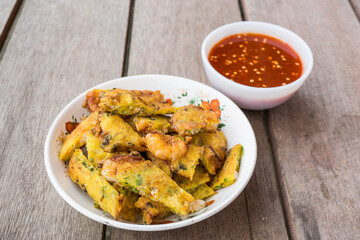 Fried prawn fritters or commonly known as Cucur Udang, a popular snack in South East Asian...