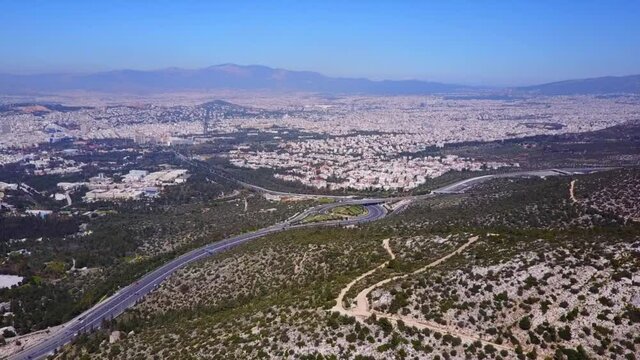 Aerial drone video of Hymetus mountain and Kessariani monastery, Attica, Greece
