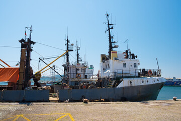 Fototapeta premium Fishing vessel at pier in old town Sozopol, Bulgaria