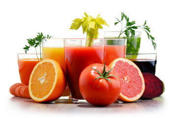 Glasses with fresh organic vegetable and fruit juices on white