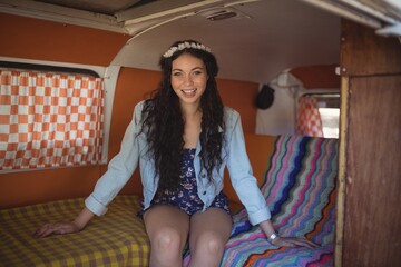 Fototapeta premium Portrait of happy woman in van