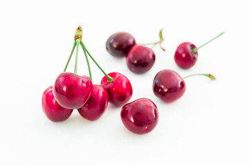 Obraz na płótnie Canvas Cherry berries on white background. Summer berries