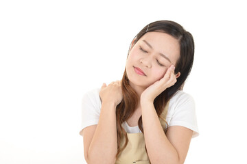 肩こりを訴える女性