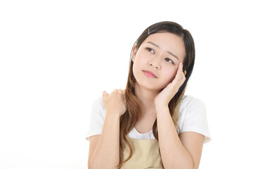 疲れた表情の女性