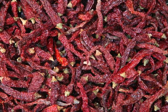 Pile Of Dried Red And Green Chili Peppers 