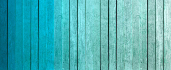 Fototapeta na wymiar lamelles de bois dégradés de teintes bleu 