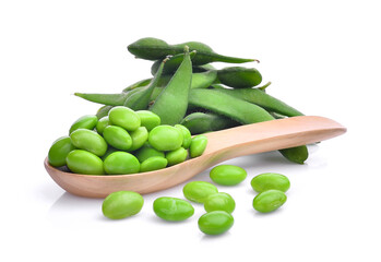 edamame green beans in wooden spoon isolated on white background