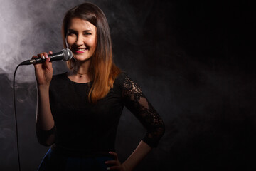 Singer on background of smoke