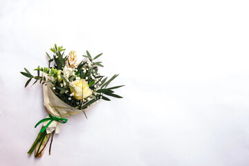 Small bouquet of freesia, tulip and hyacinth flowers on white background