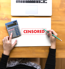 CENSORED  Businessman at work. Close-up top view of man working